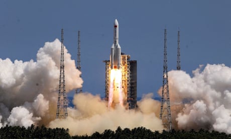 A Long March 5B rocket blasts off from Wenchang spacecraft launch site in Hainan province, China, on 24 July