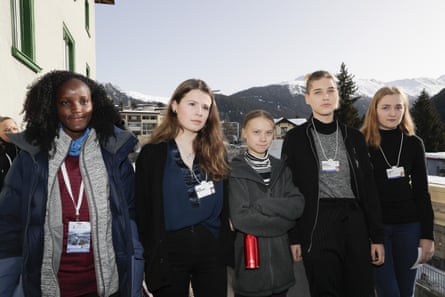 Nakate, Luisa Neubauer, Greta Thunberg, Isabelle Axelsson and Loukina Tille at Davos. When it first published the photo, AP cropped out Nakate.