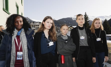 Climate activist Vanessa Nakate, Luisa Neubauer, Greta Thunberg, Isabelle Axelsson and Loukina Tille, from left, in Davos, Switzerland, in 2020. Nakate was cropped out of the image when it was published.