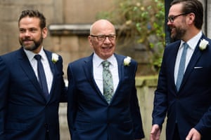 Rupert Murdoch flanked by his sons Lachlan (left) and James (right) at St Bride’s church on Fleet Street, London, on 5 March 2016 to attend a ceremony of celebration a day after the official marriage of Rupert and Jerry Hall.