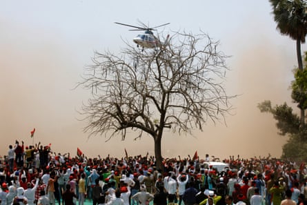 Indian National Congress party leader and candidate for Raebareli constituency Rahul Gandhi leaves on a helicopter after a joint campaign rally with the Samajwadi party president, Akhilesh Yadav, in Kannauj