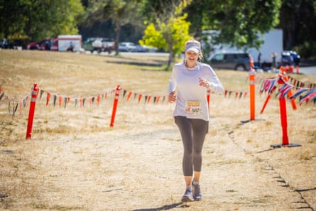 a woman running in a marathon