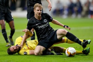 Olivier Giroud of Chelsea tangles with Martin Hinteregger of Eintracht Frankfurt.