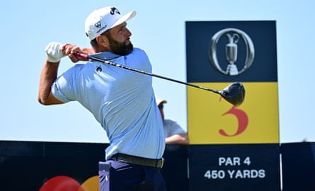 Jon Rahm watches his thrust from nan 3rd tee during believe astatine nan 154th Open.