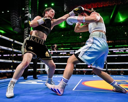 Katie Taylor aims a punch at Flora Pili