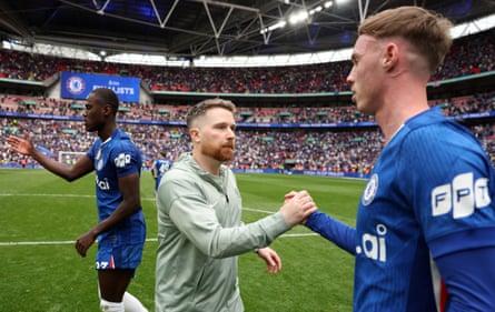 Calum McFarlane shakes the hand of Cole Palmer