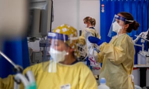 Staff working on an intensive care ward at St George’s hospital, south London.