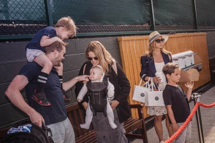 A family including young children on site at the All England Club