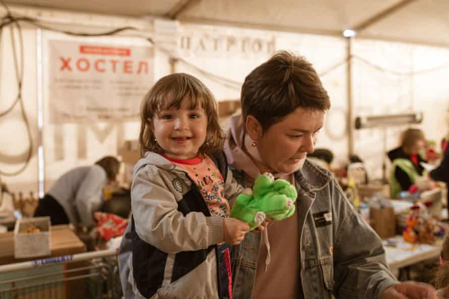 A mother and child arrive to safety after spending weeks trapped in the besieged city of Mariupol.