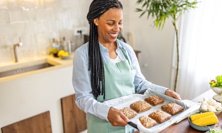 woman with tray of cookies