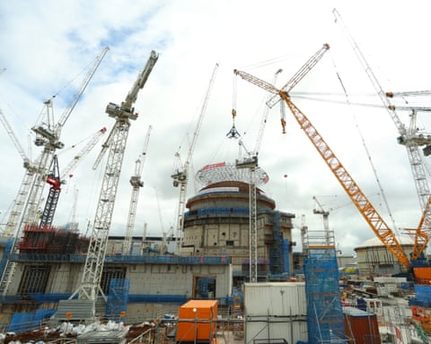 Large cranes assembling part of Hinkley C nuclear power station