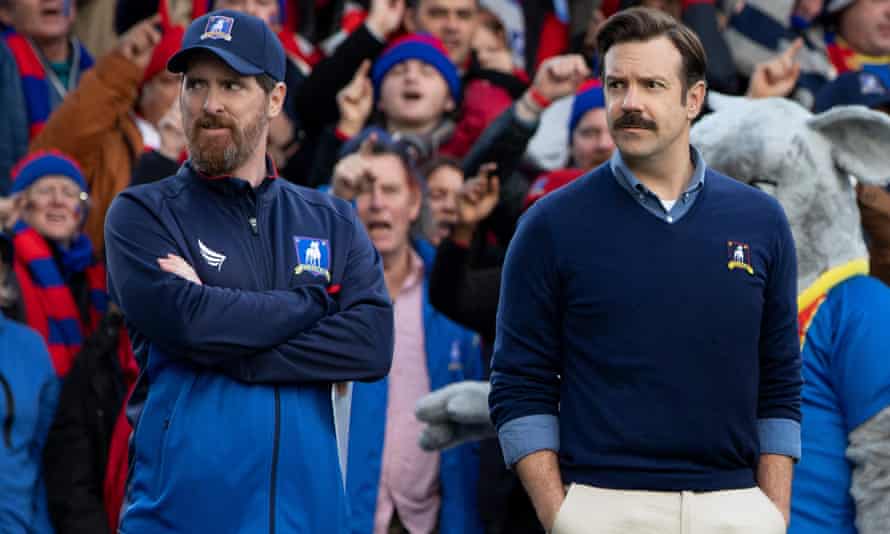 Kind-hearted... Brendan Hunt (left) and Jason Sudeikis as Ted Lasso on Apple TV+.