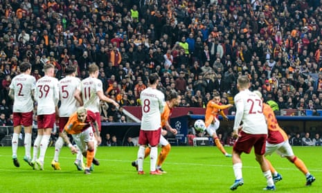 Hakim Ziyech of Galatasaray pulls a goal back from a free-kick against Manchester United.