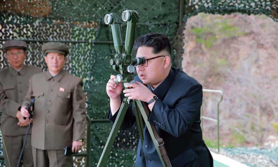 Kim Jong-un watches a submarine-launched missile test on 24 April.