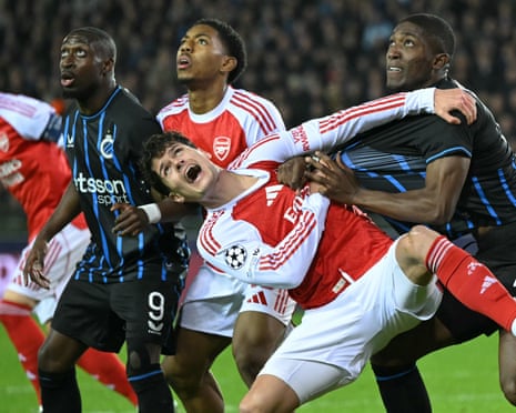 Arsenal's Christian Norgaard is manhandled by Joel Ordonez of Club Brugges