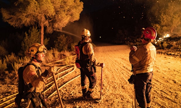 Firefighters battle a blaze in Catalonia, Spain.