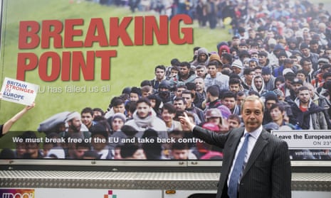 Nigel Farage with the poster