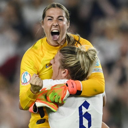 England’s Mary Earps and Millie Bright celebrate after the match.