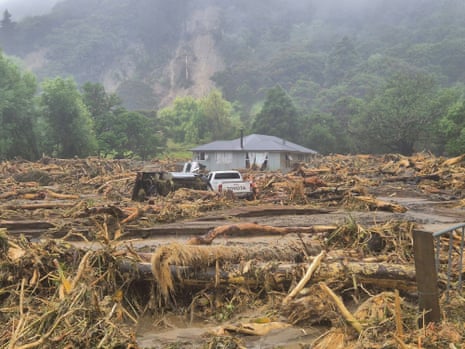 The aftermath of flooding that hit Punaruku in New Zealand’s North Island. People had to be rescued from their rooftops, firefighters said