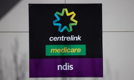 Centrelink, Medicare and NDIS sign on the wall of a building