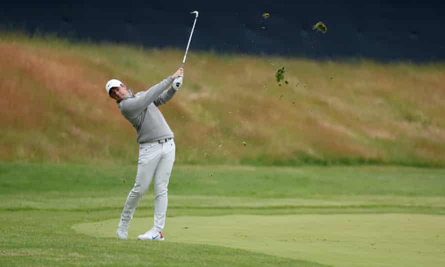 Northern Ireland's Rory McIlroy makes the second shot in the first hole in the final.