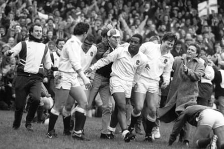 England’s Chris Oti celebrates with teammates after scoring his third try of the afternoon during England’s 35-3 win over Ireland.