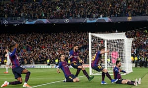 Barcelona’s Lionel Messi celebrates scoring their third goal with Sergi Roberto, Luis Suarez and Sergio Busquets.