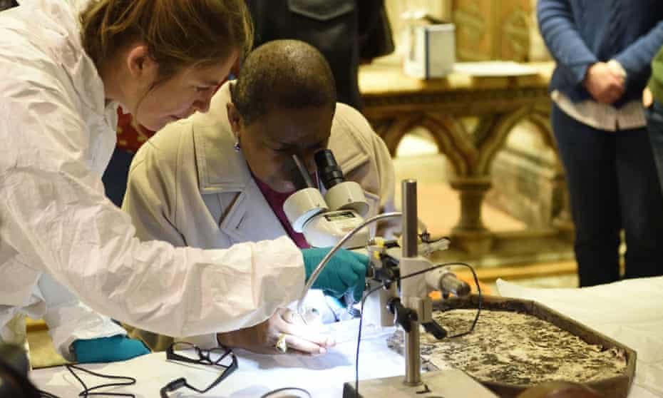 Researchers examine the remains at St Mary and St Eanswythe’s church in Folkestone.