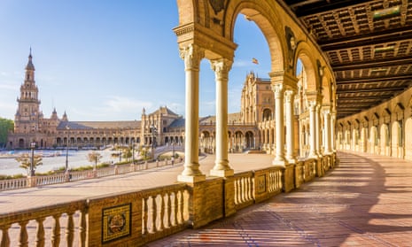 A view across the colonnaded Plaza de Espana in Seville.