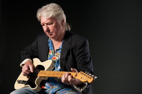 English guitarist and songwriter Mick Ralphs, founding member of the bands Mott the Hoople and Bad Company, pictured in 2013. He has died aged 81.