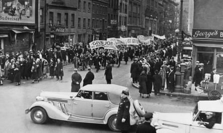 Supporters of the New Deal agency march through New York in protest at corporate layoffs, January 1937.