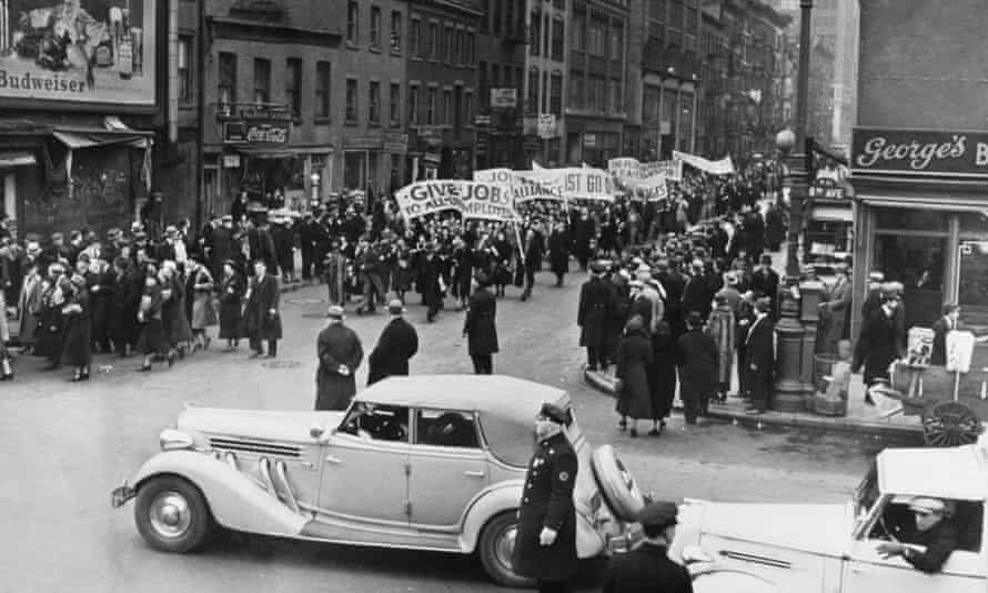 Supporters of the New Deal agency march through New York in protest at corporate layoffs, January 1937.