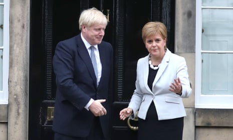 Nicola Sturgeon and Boris Johnson outside Bute House in Edinburgh.