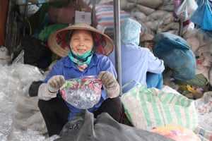 Nguyễn Thị Hồng Thắm is paid $6.50 a day to sort recycling on the outskirts of Hanoi.