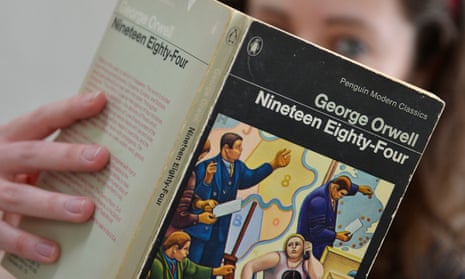 Woman holding George Orwell’s Nineteen Eighty-Four