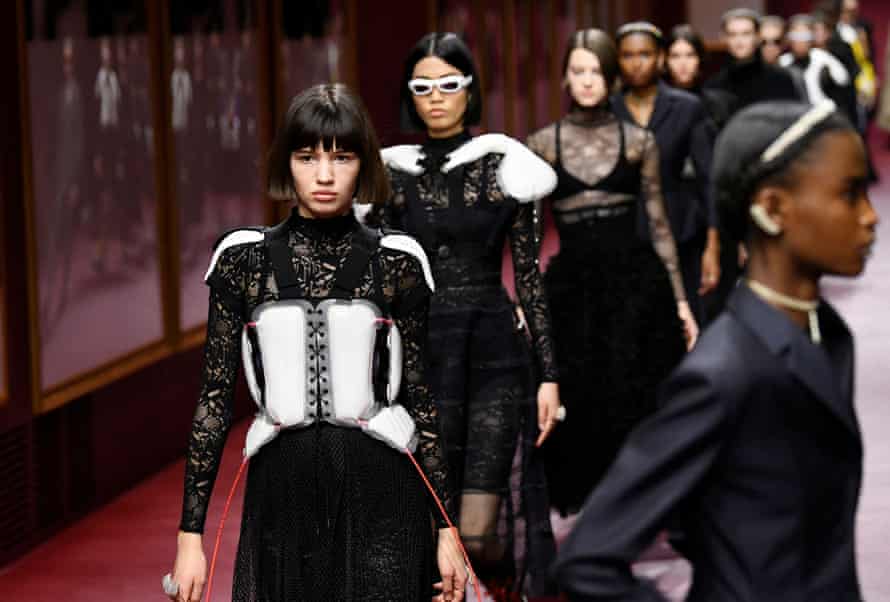 Models present creations by designer Maria Grazia Chiuri as part of her Fall-Winter 2022-23 Women’s ready-to-wear collection show for fashion house Dior.