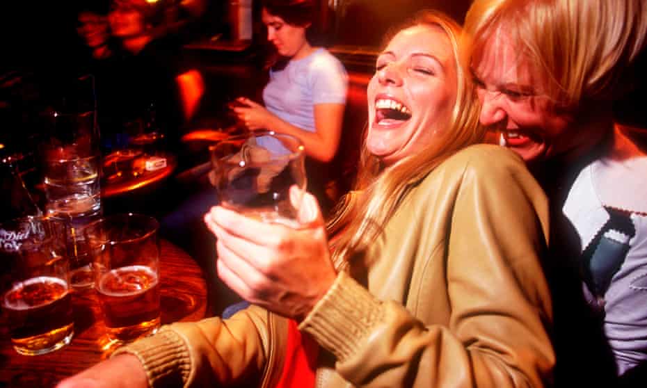 Women drinking in a pub