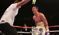 Anthony Crolla celebrates with his trainer Joe Gallagher.