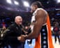 Steve Ballmer shakes hands with Kawhi Leonard after a Clippers win at the arena