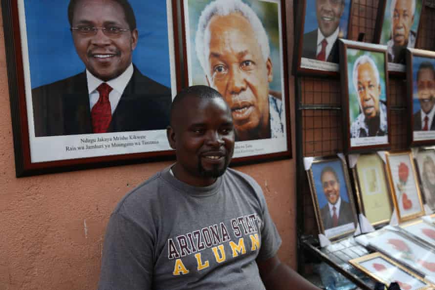 Poster-seller Hawi Idrissa says that he sells more images of Tanzania’s current president than of Jesus, the Virgin Mary and the country’s founding father, Julius Nyerere, but selling to the state offices that are required to display the poster involves bribery and issuing false receipts to corrupt officials.