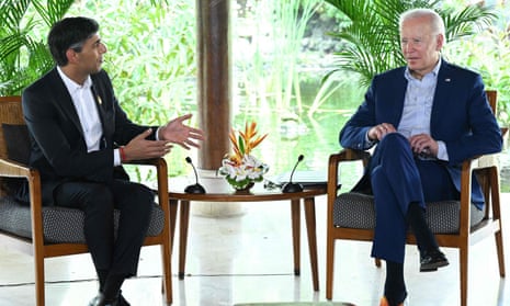 Rishi Sunak and Joe Biden  with palms in background