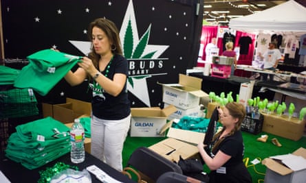 Workers from the Starbuds marijuana dispensary unpack non-marijuana goods at the Denver County Fair’s Pot Pavillion last year.