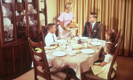 A family having Thanksgiving dinner, in 1962.