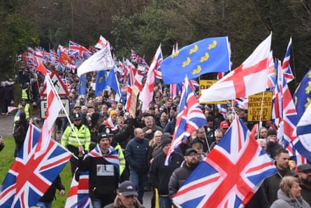 People waving flags on the march