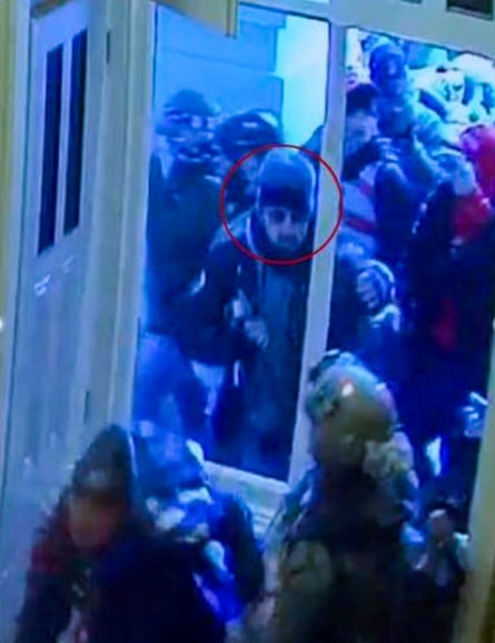 Philip Sean Grillo, indicated by a red circle, at the capitol on 6 January 2021.
