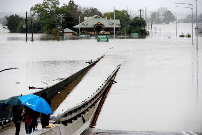 Flooding at Windsor Bridge on Wednesday. Locals are advised they may return to some parts of the area with caution.
