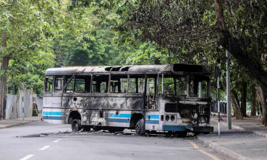 A torched bus in Colombo, Sri Lanka
