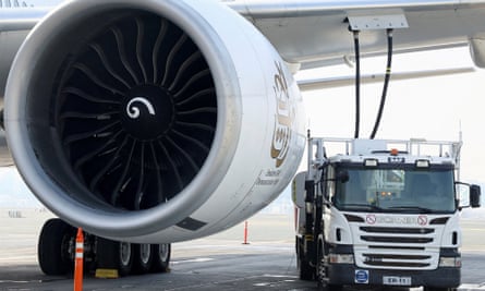 A fuel truck fills the Emirates Airlines Boeing 777-300ER with SAF at Dubai airport, in Dubai, in January 2023.