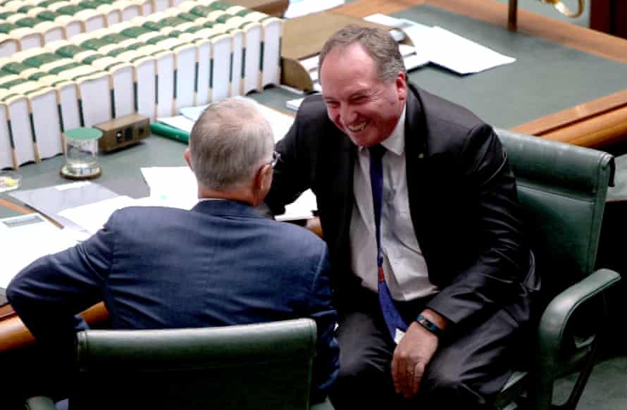 Minister for Agriculture and Water Barnaby Joyce talks with PM Malcolm Turnbull during question time in the House of Representatives in Canberra this afternoon, Tuesday 19th April 2016.