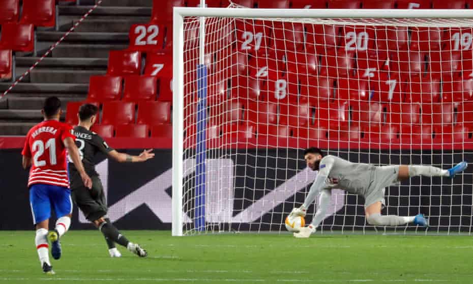Bruno Fernandes squeezes the ball under Granada goalkeeper Rui Silva to make it 2-0 to Manchester United.